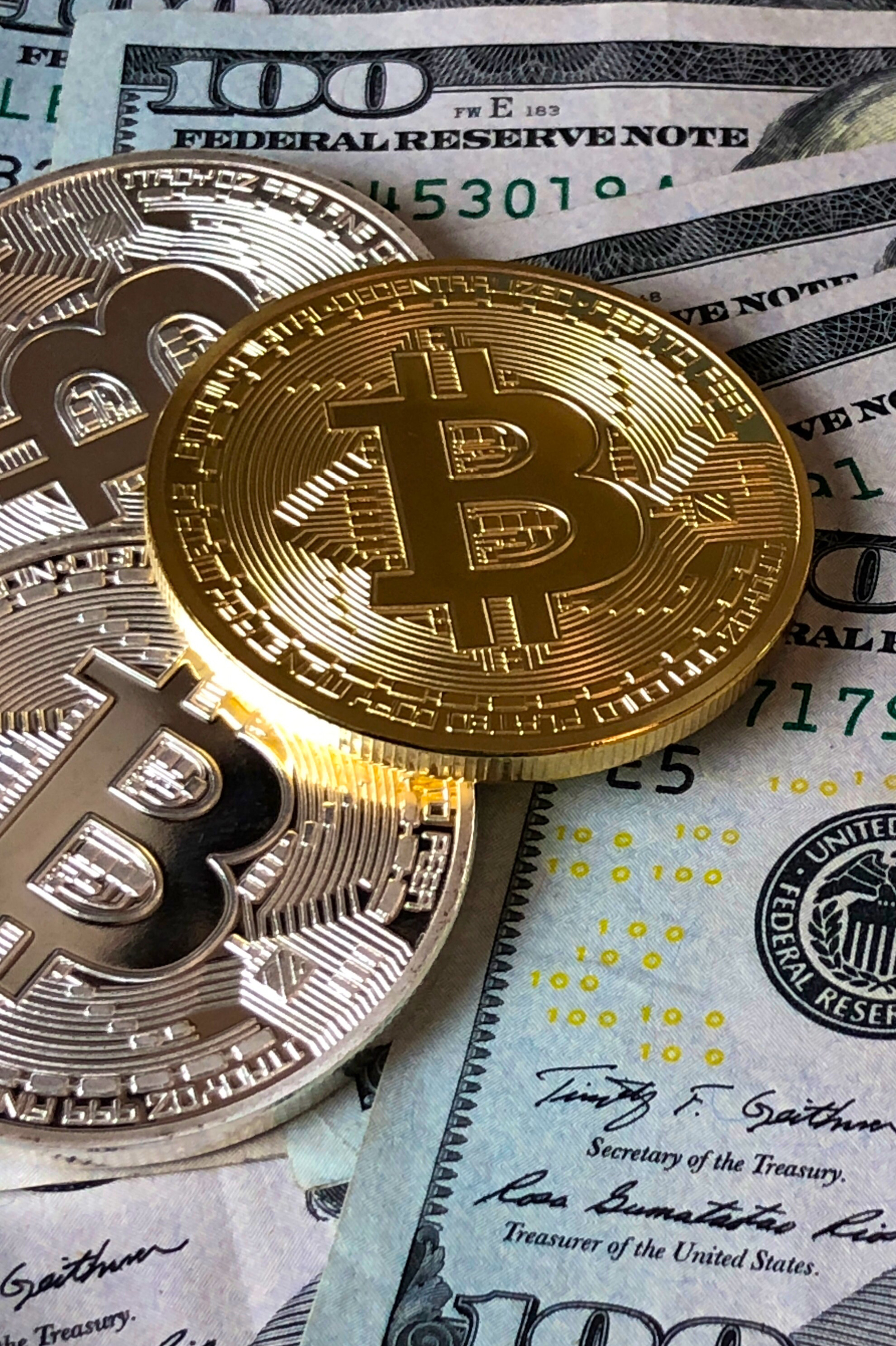 Bitcoins on top of paper money