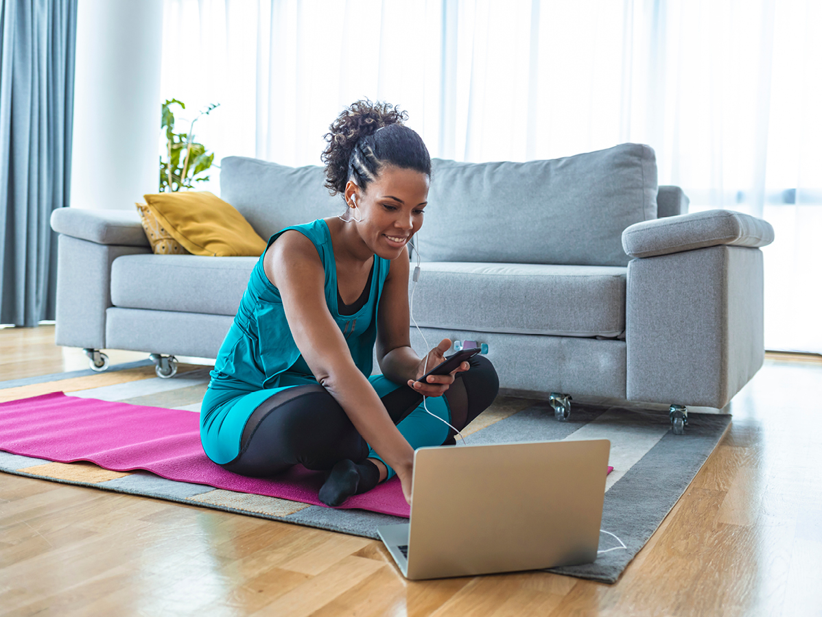 person doing yoga in living room