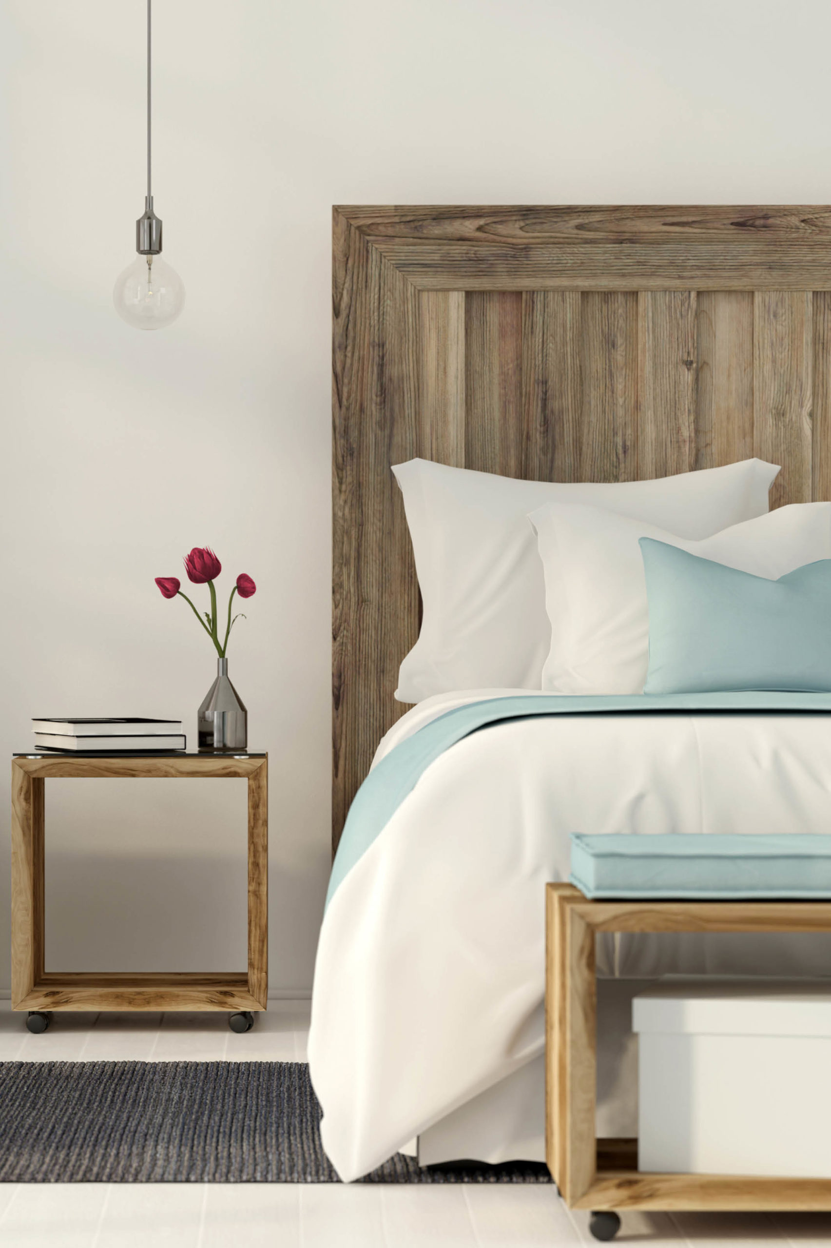 white bed with wooden headboard