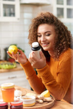 Woman looking at vitamins