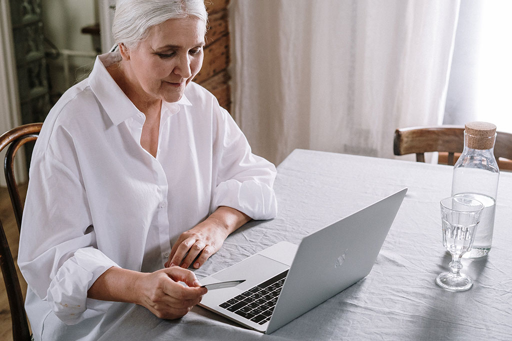 older woman on computer