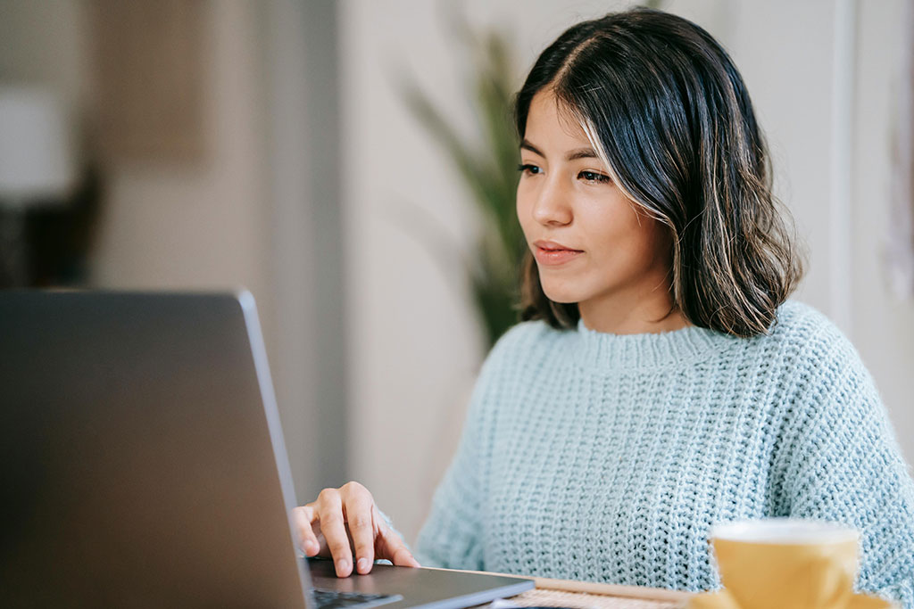 Young woman using laptop