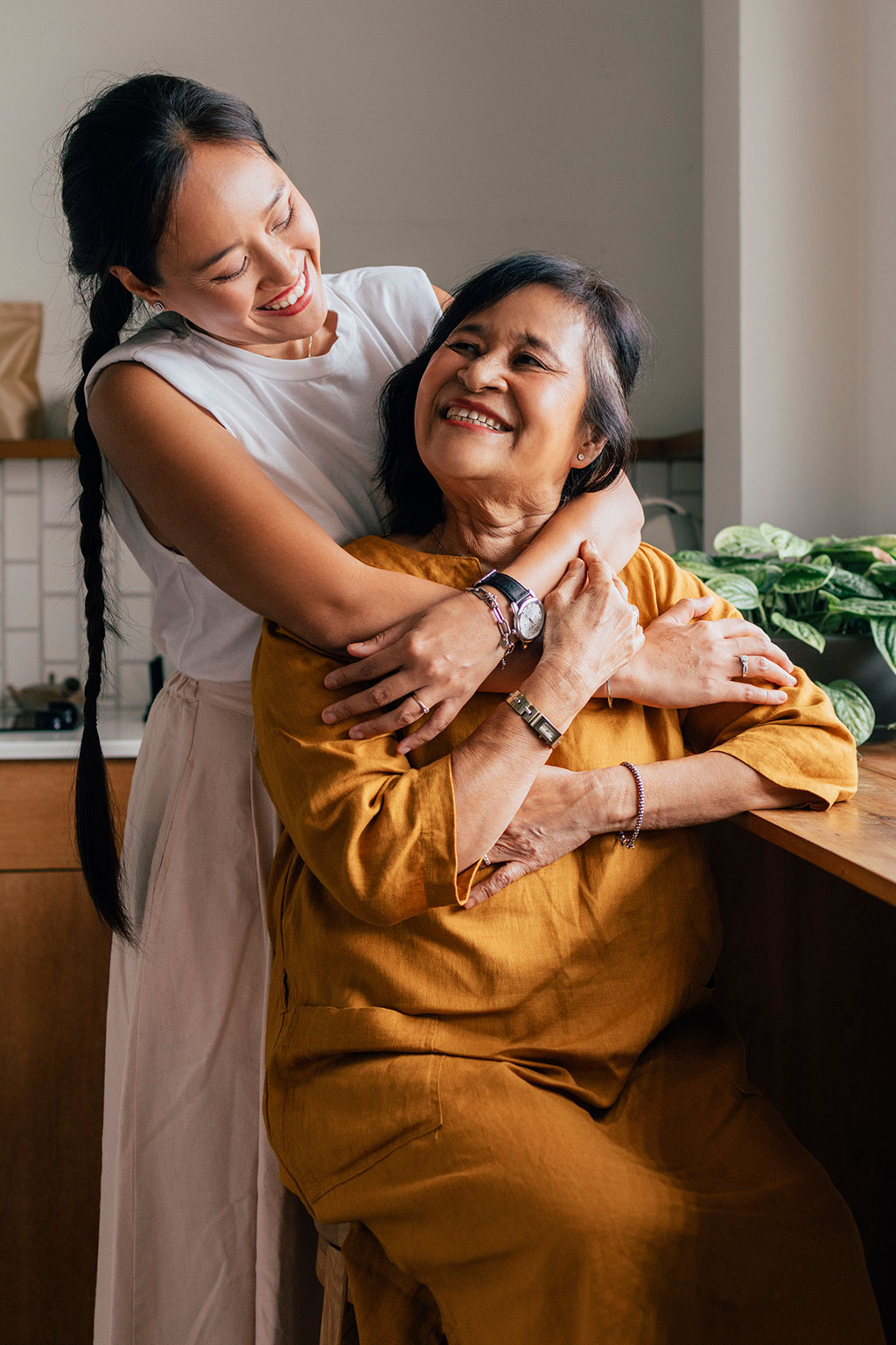 Mom and daughter hugging