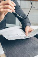 Man looking over papers