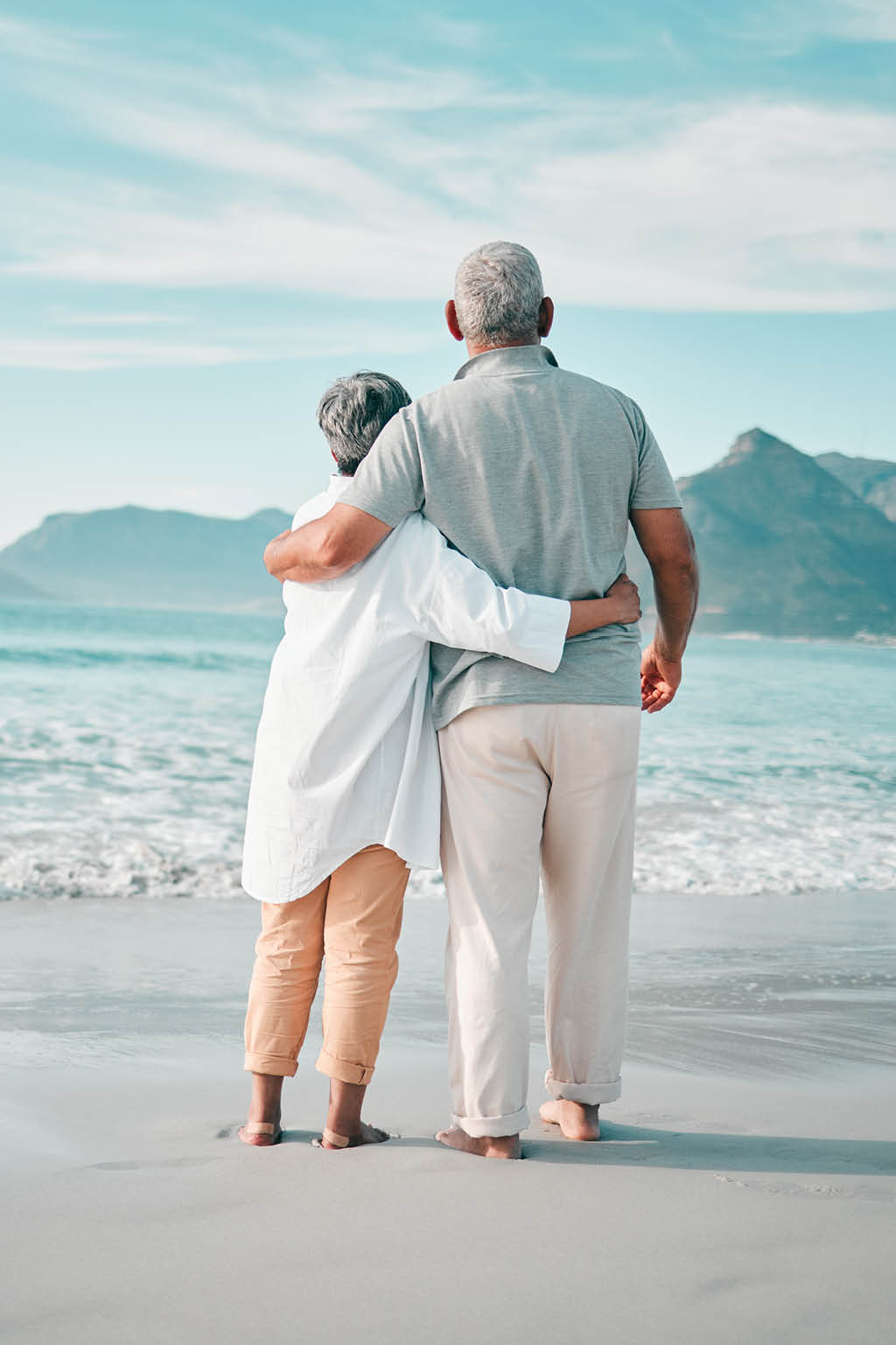 Retired couple on beach