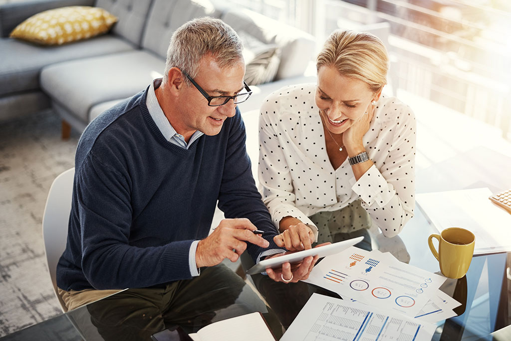 Older couple looking over finances