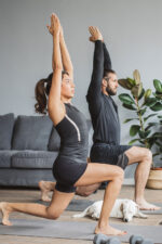 Couple exercising at home