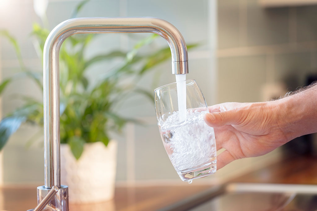 Filling up cup with water