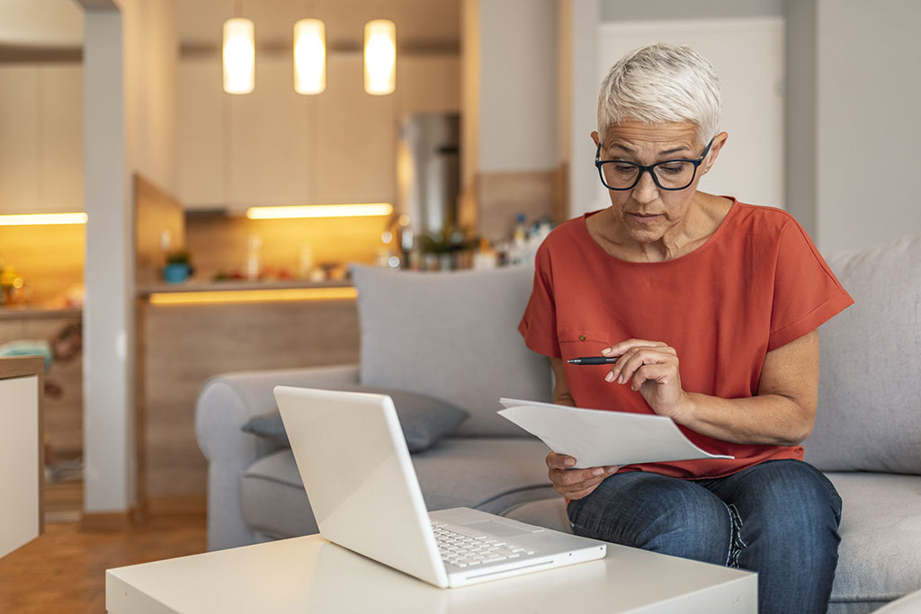 Older woman looking over finances