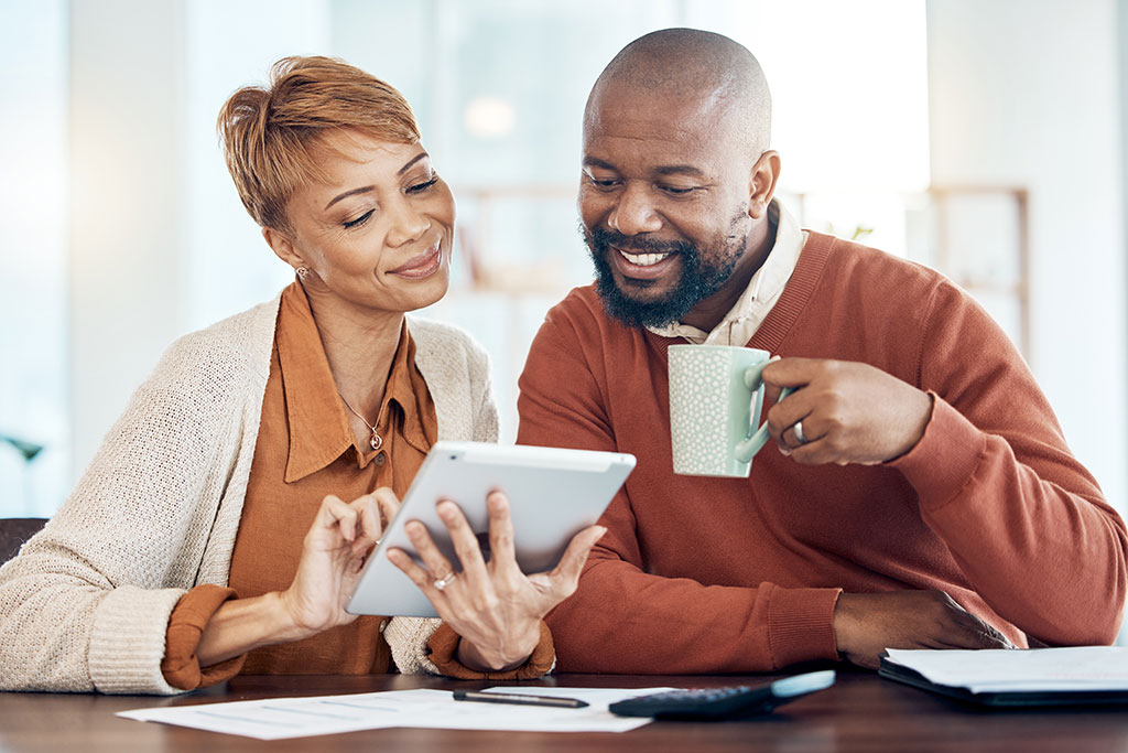 Older couple looking at tablet