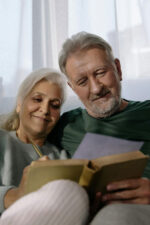 Older couple sitting on couch