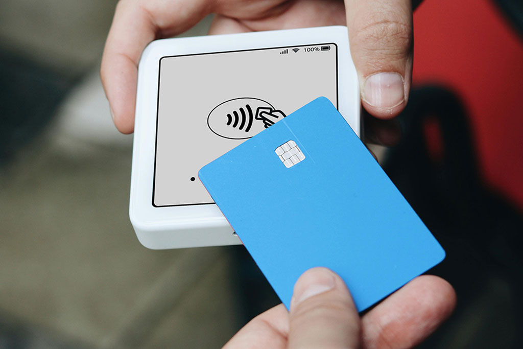 Person using tap to pay