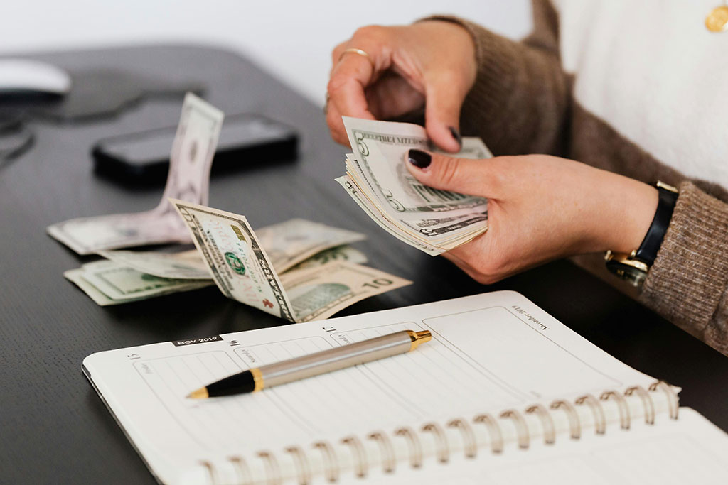Woman going through money