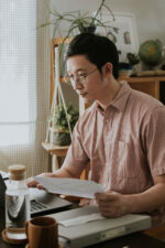 Man looking through finances