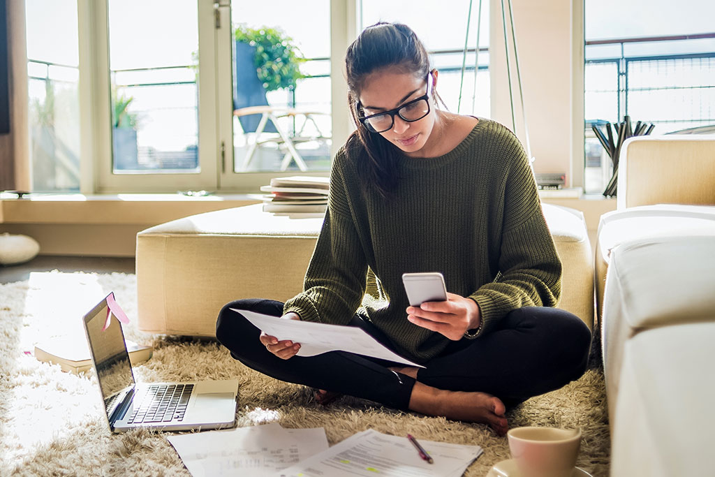 Woman looking through finances
