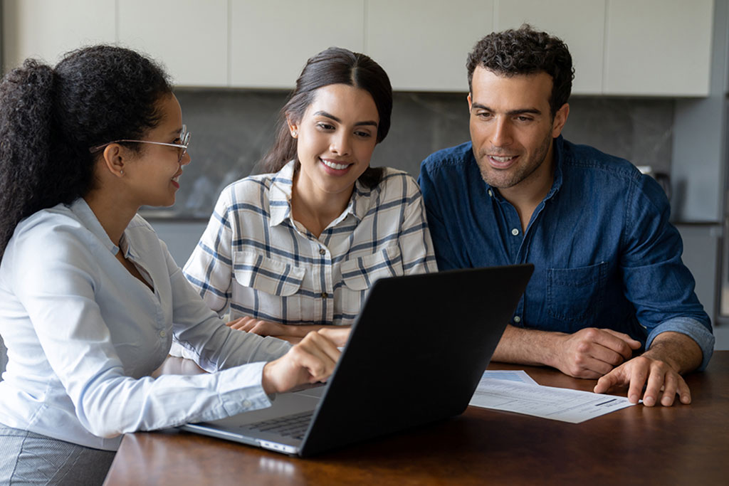 Couple talking to advisor