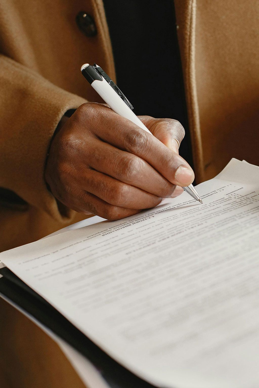 Person signing papers