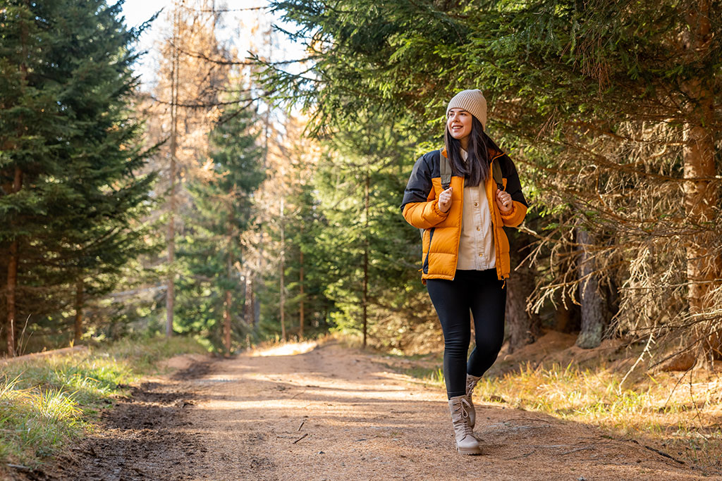 Woman walking nature trail